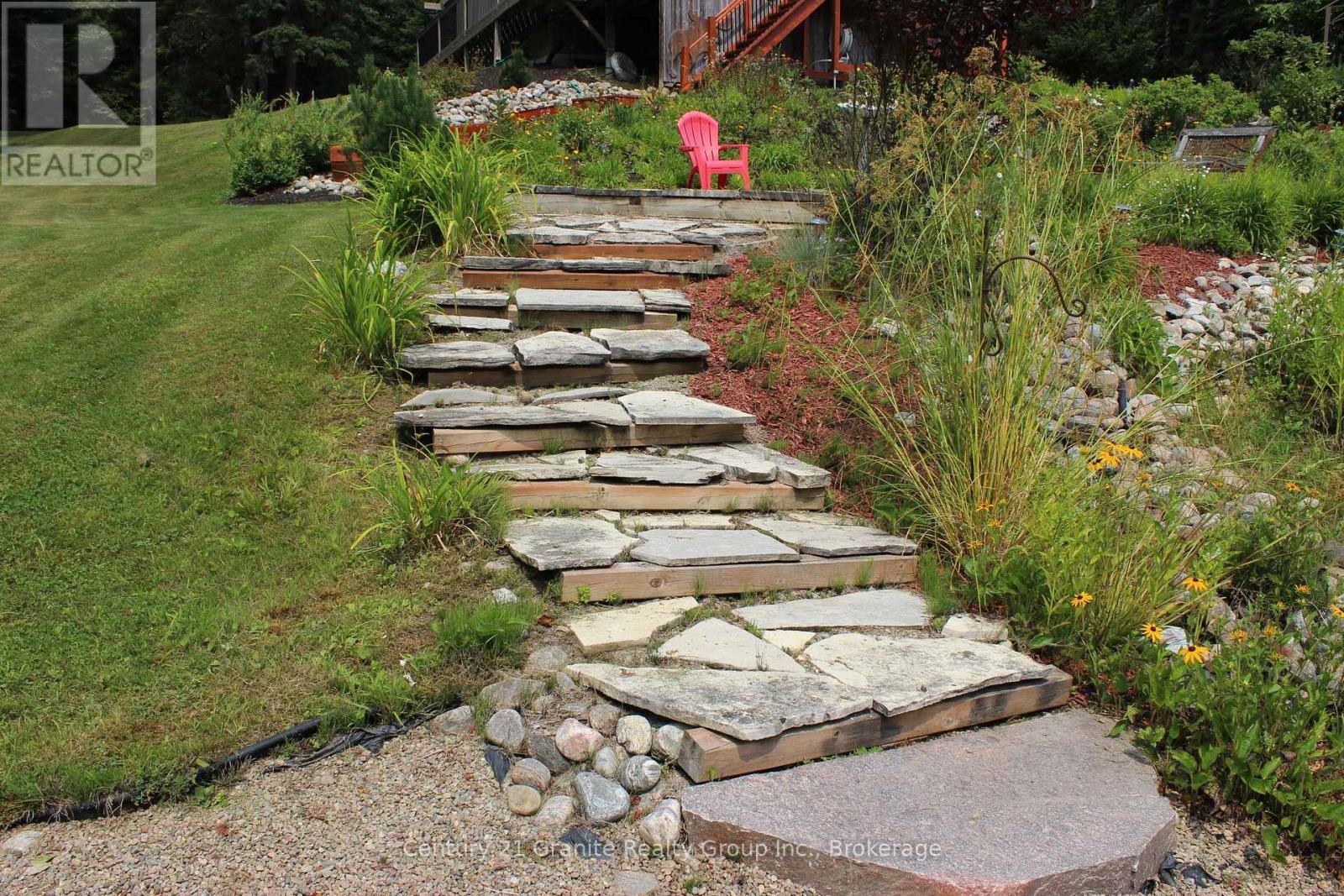 Just some of the landscaping - 1082 Green Lake Road, Algonquin Highlands (Stanhope), ON - Outdoor
