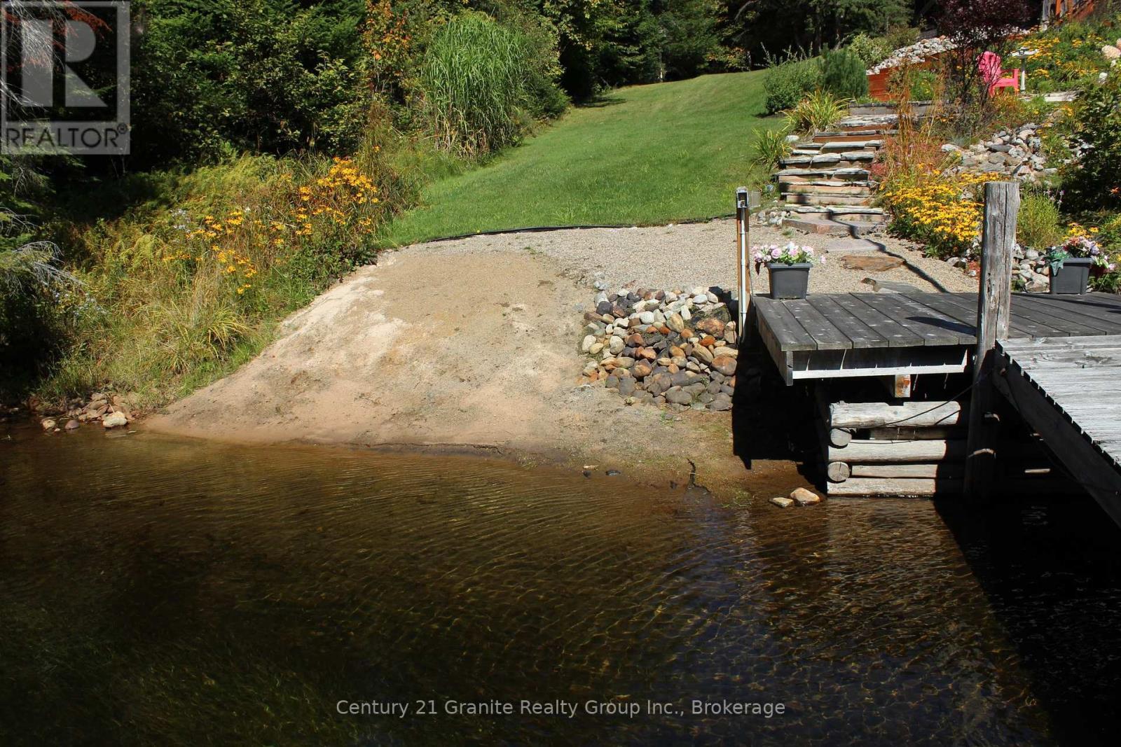 1082 Green Lake Road, Algonquin Highlands (Stanhope), ON - Outdoor With Body Of Water