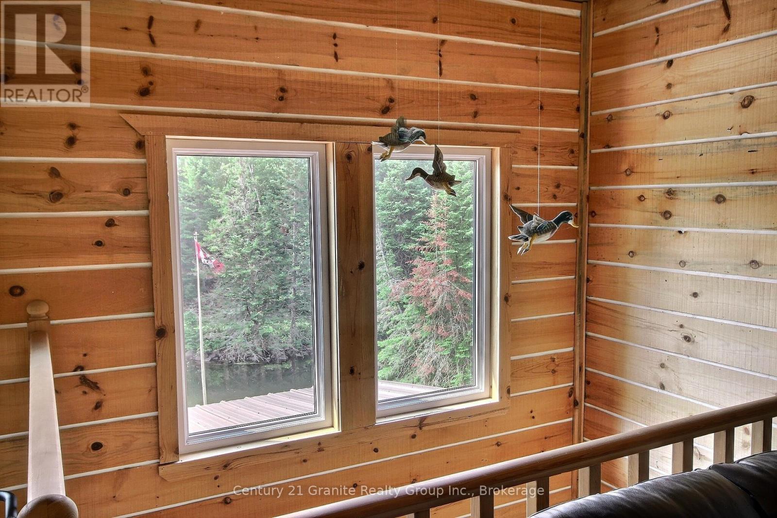 The Ducks like it! - 1082 Green Lake Road, Algonquin Highlands (Stanhope), ON - Indoor Photo Showing Other Room