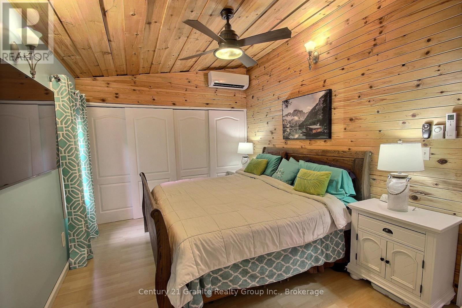 Primary Bedroom - 1082 Green Lake Road, Algonquin Highlands (Stanhope), ON - Indoor Photo Showing Bedroom