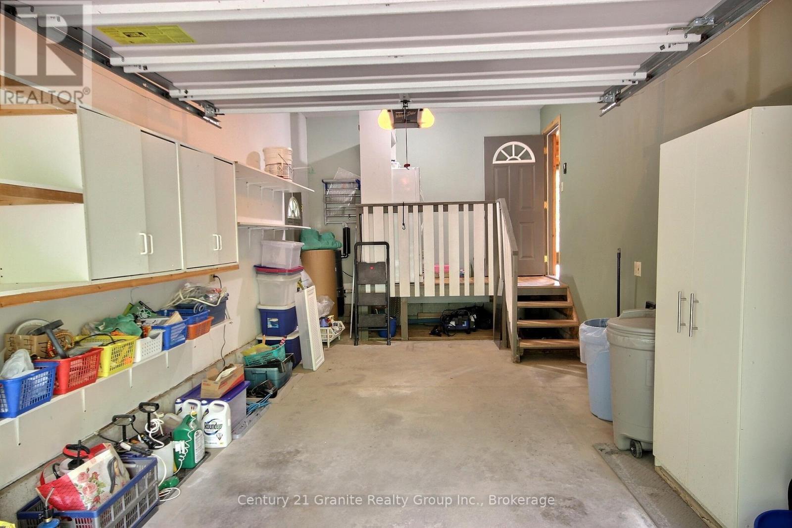 Attached garage - 1082 Green Lake Road, Algonquin Highlands (Stanhope), ON - Indoor Photo Showing Garage