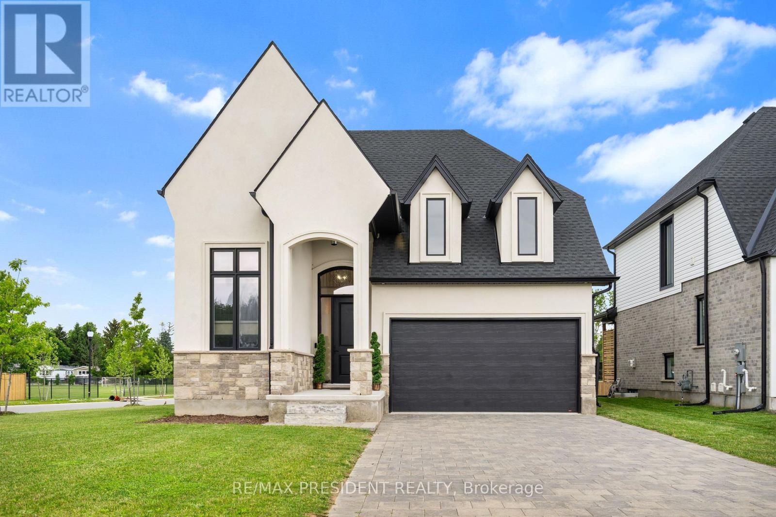 191 Foxborough Place, Thames Centre, ON - Outdoor With Facade