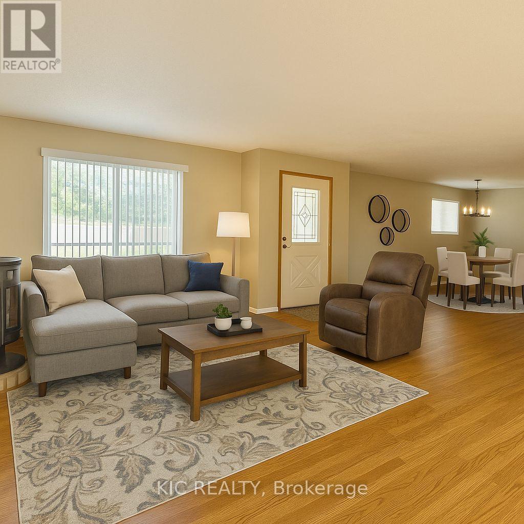 living room virtually staged - 2183 Asphodel 5 Line, Asphodel-Norwood, ON - Indoor Photo Showing Living Room