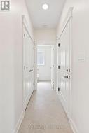 Garage access and Powder Room -