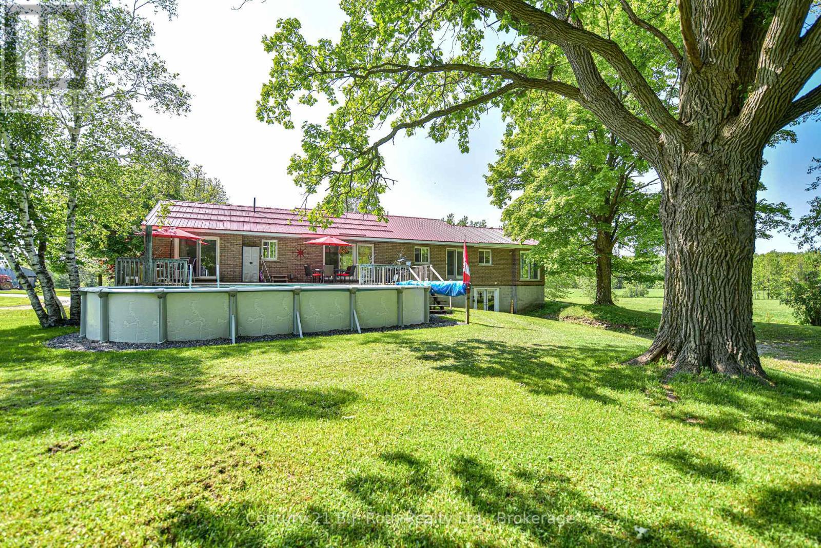 1579 Wainman Line, Severn, ON - Outdoor With Above Ground Pool With Backyard