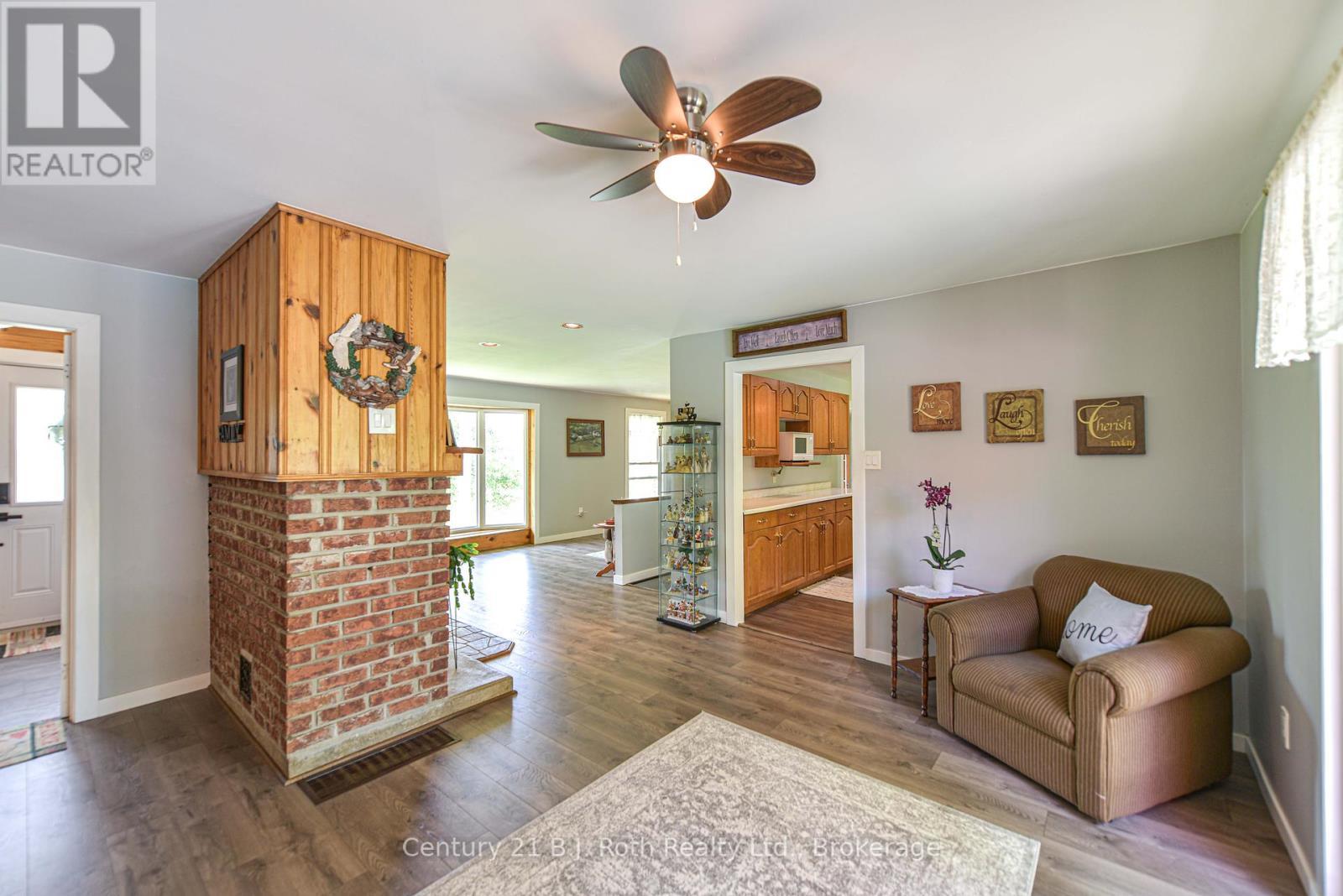 1579 Wainman Line, Severn, ON - Indoor Photo Showing Living Room With Fireplace