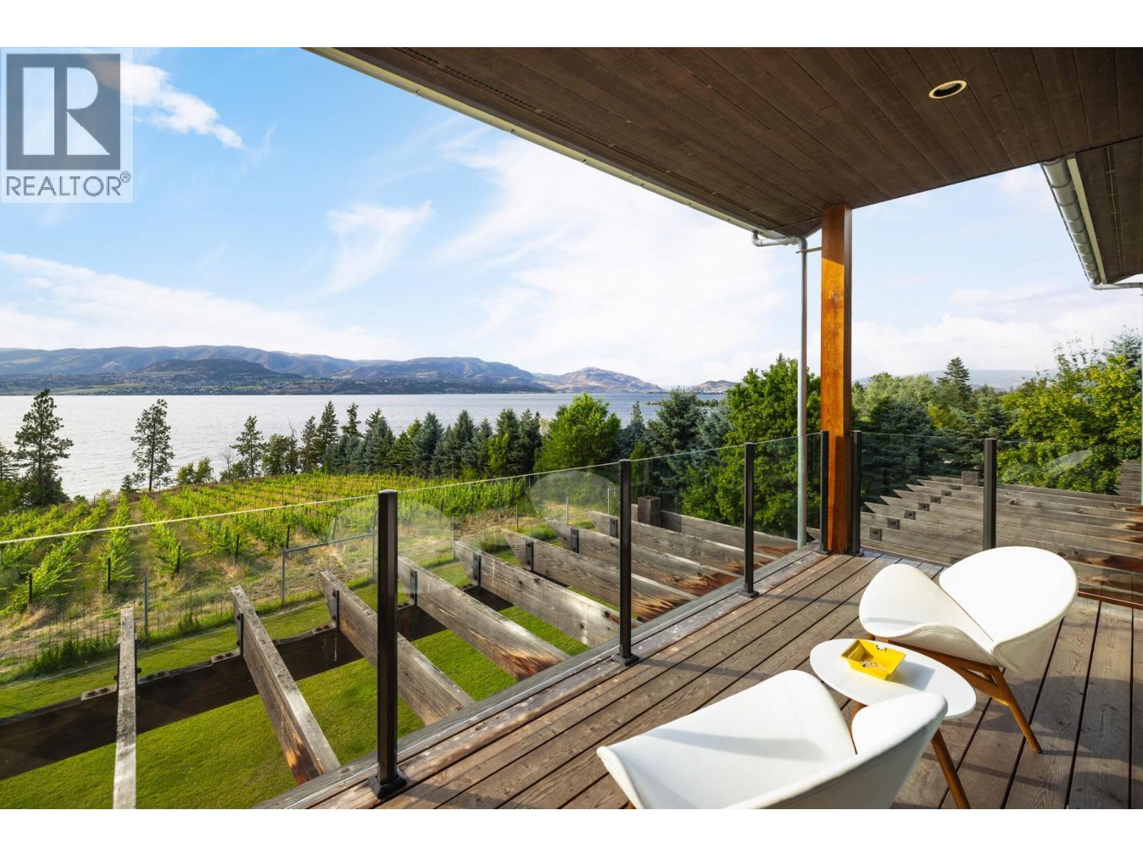 4840 Lakeshore Road, Kelowna, BC - Outdoor With Body Of Water With Deck Patio Veranda With View With Exterior