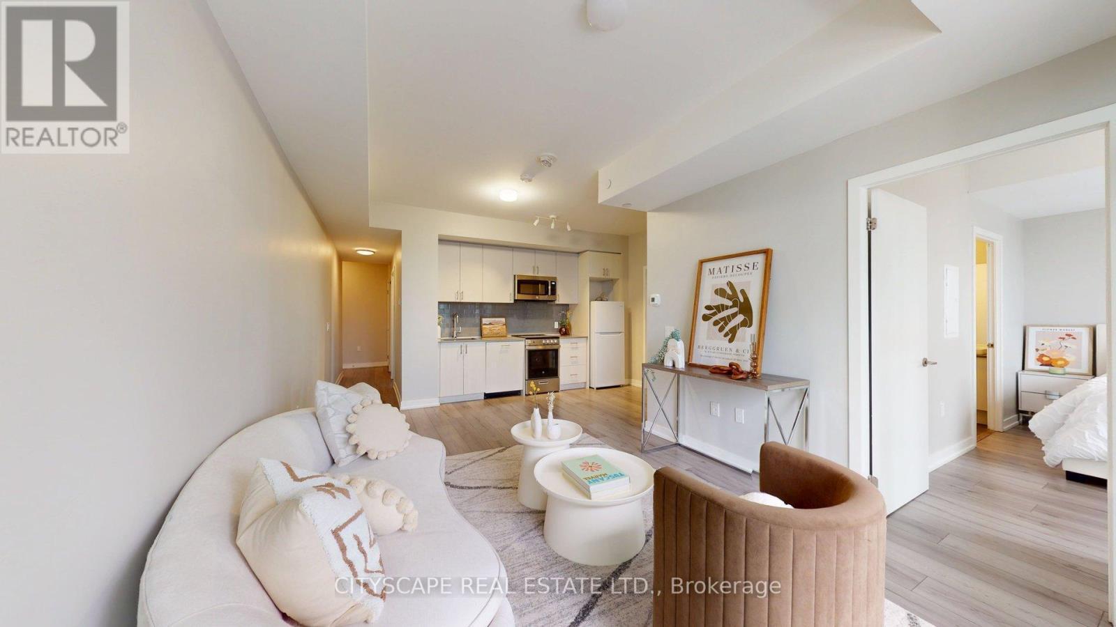 303 - 1195 The Queens Way, Toronto, ON - Indoor Photo Showing Living Room