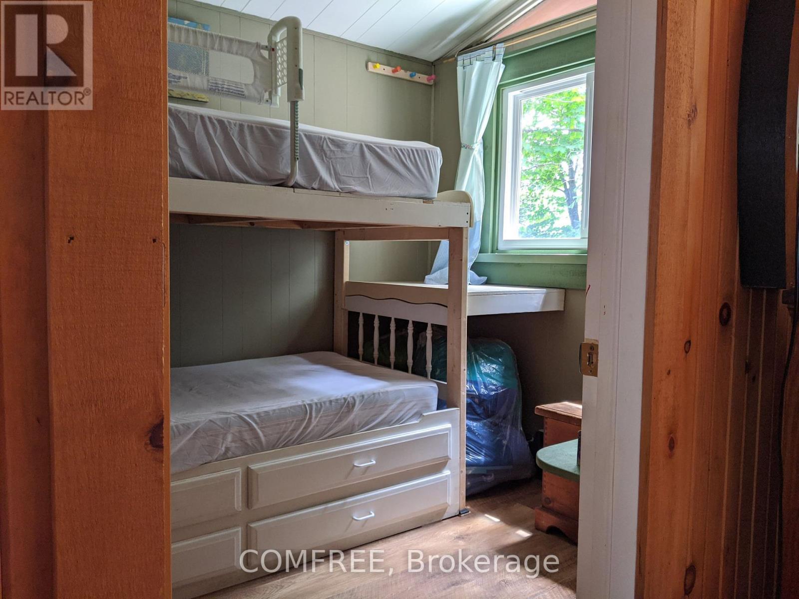 299 Sherwood Drive, Perry, ON - Indoor Photo Showing Bedroom