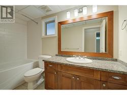 Main bathroom with granite counters -