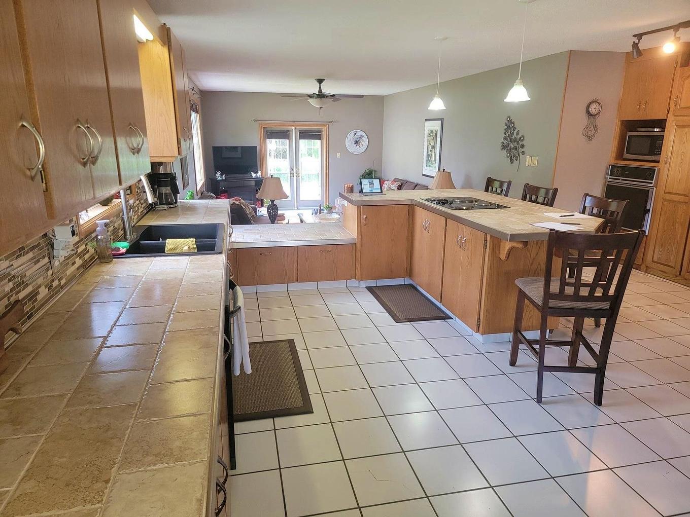 104 Centennial Drive, Schreiber, ON - Indoor Photo Showing Kitchen With Double Sink