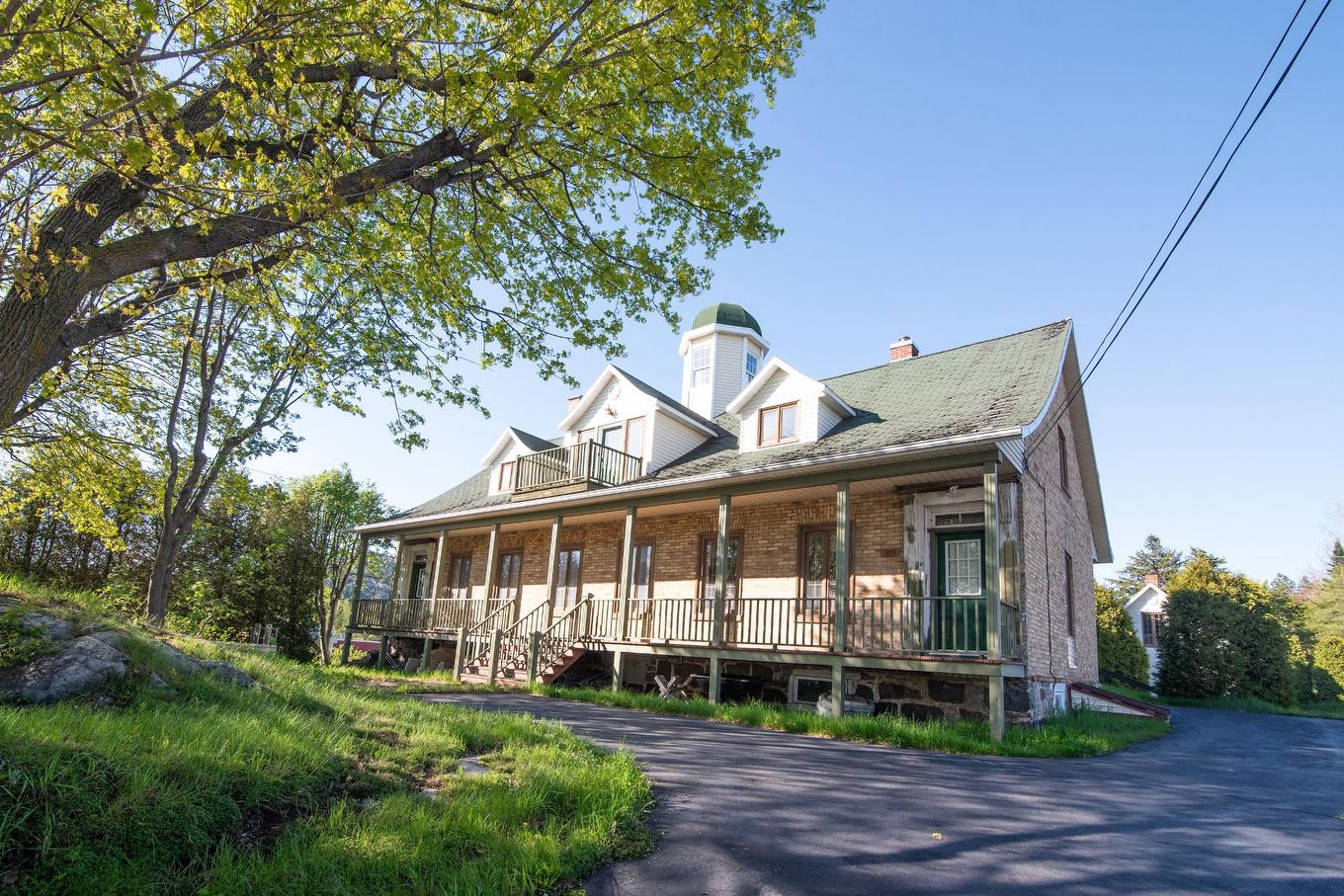 Frontage - 309 Rue Taché, Saint-Pascal, QC - Outdoor With Deck Patio Veranda
