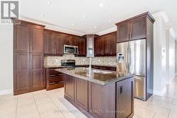 Gourmet kitchen w/SS appliances, island, pantry -