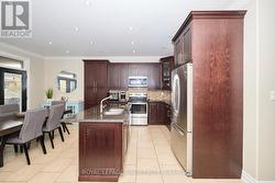 Gourmet kitchen w/SS appliances, island, pantry -