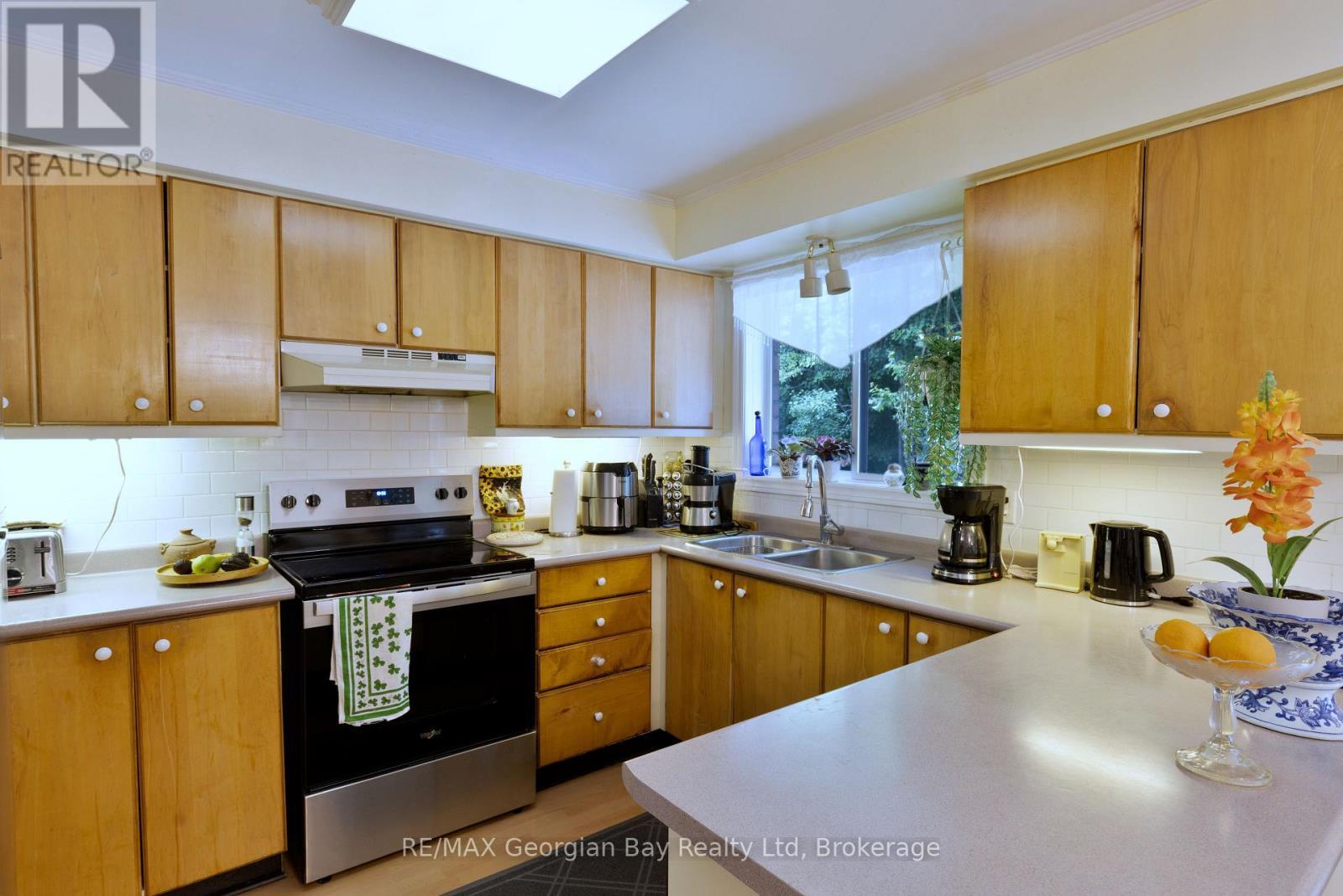 1057 Dina Crescent, Midland, ON - Indoor Photo Showing Kitchen With Double Sink