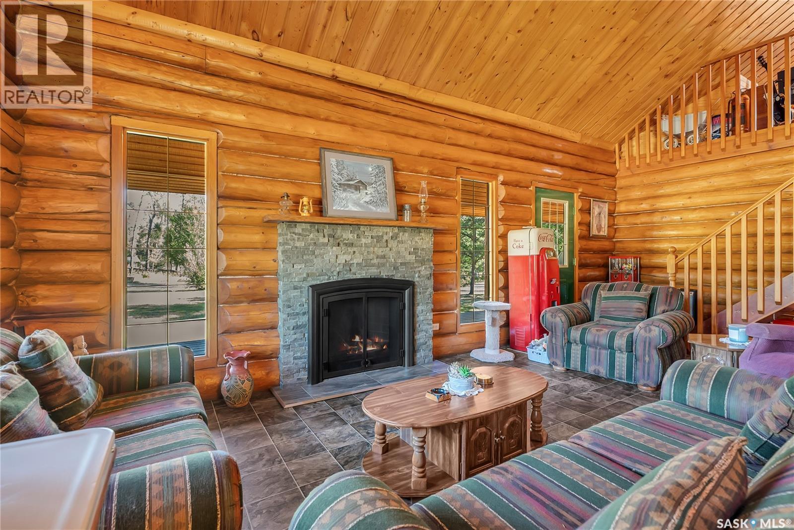 Bergen Acreage, Torch River Rm No. 488, SK - Indoor Photo Showing Living Room With Fireplace