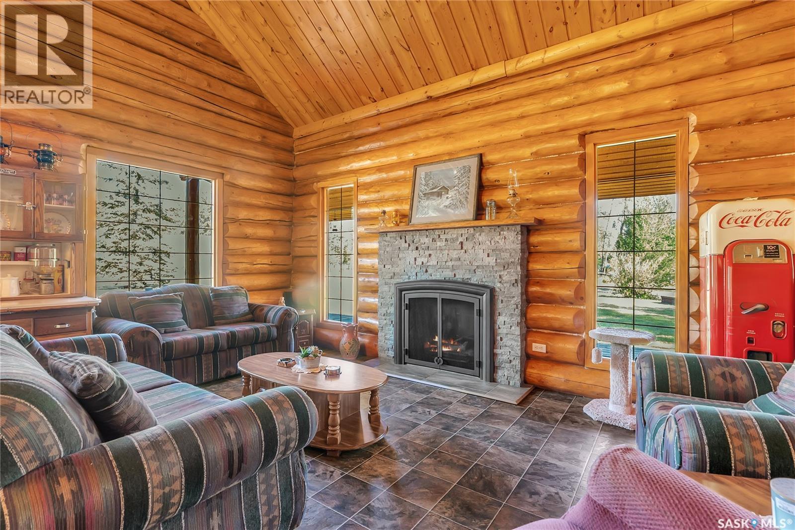 Bergen Acreage, Torch River Rm No. 488, SK - Indoor Photo Showing Living Room With Fireplace
