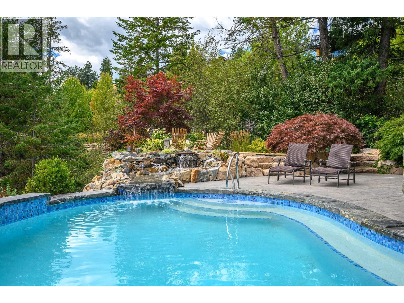 602 Falcon Point Way, Vernon, BC - Outdoor With In Ground Pool With Backyard