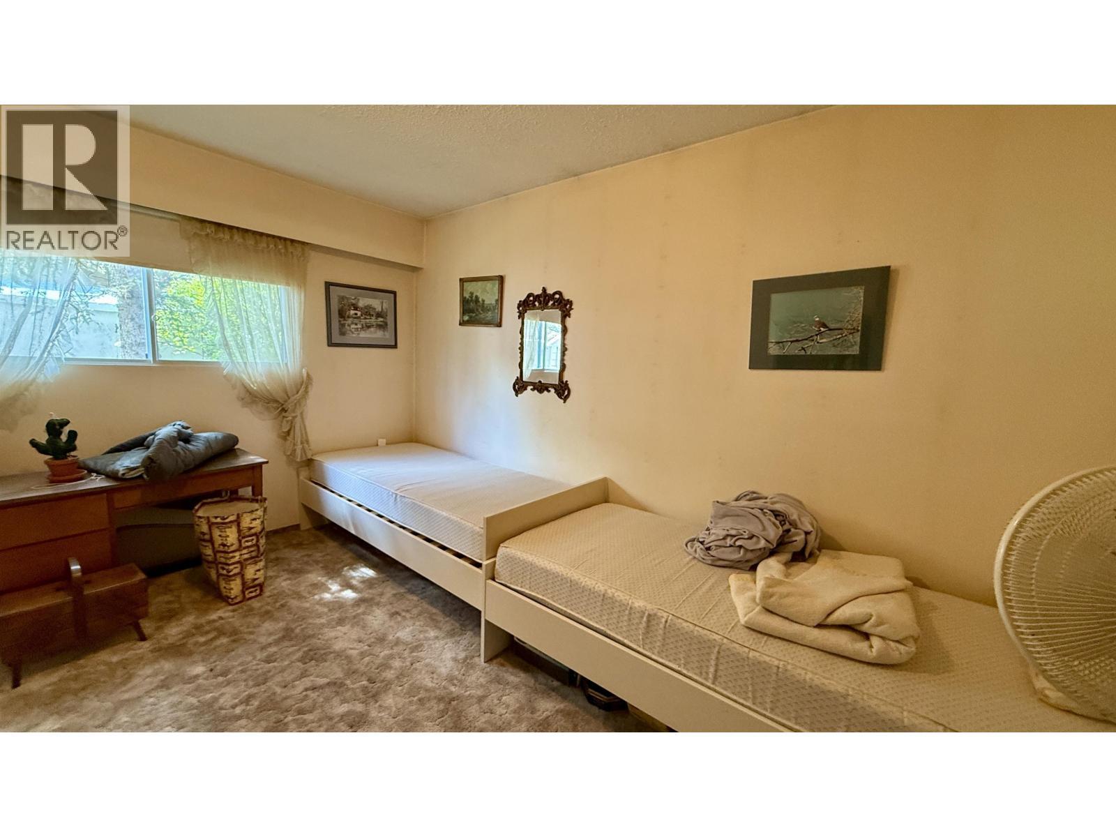 6367 Mulligan Drive, Horse Lake, BC - Indoor Photo Showing Bedroom