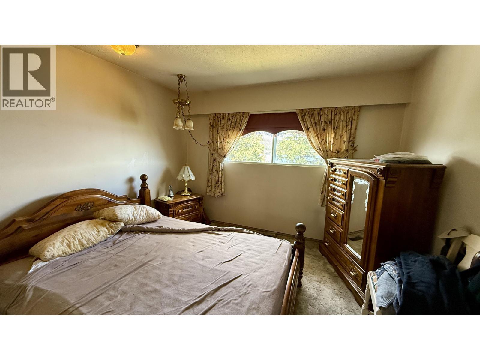 6367 Mulligan Drive, Horse Lake, BC - Indoor Photo Showing Bedroom