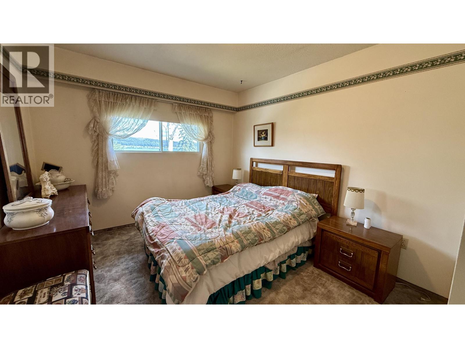 6367 Mulligan Drive, Horse Lake, BC - Indoor Photo Showing Bedroom