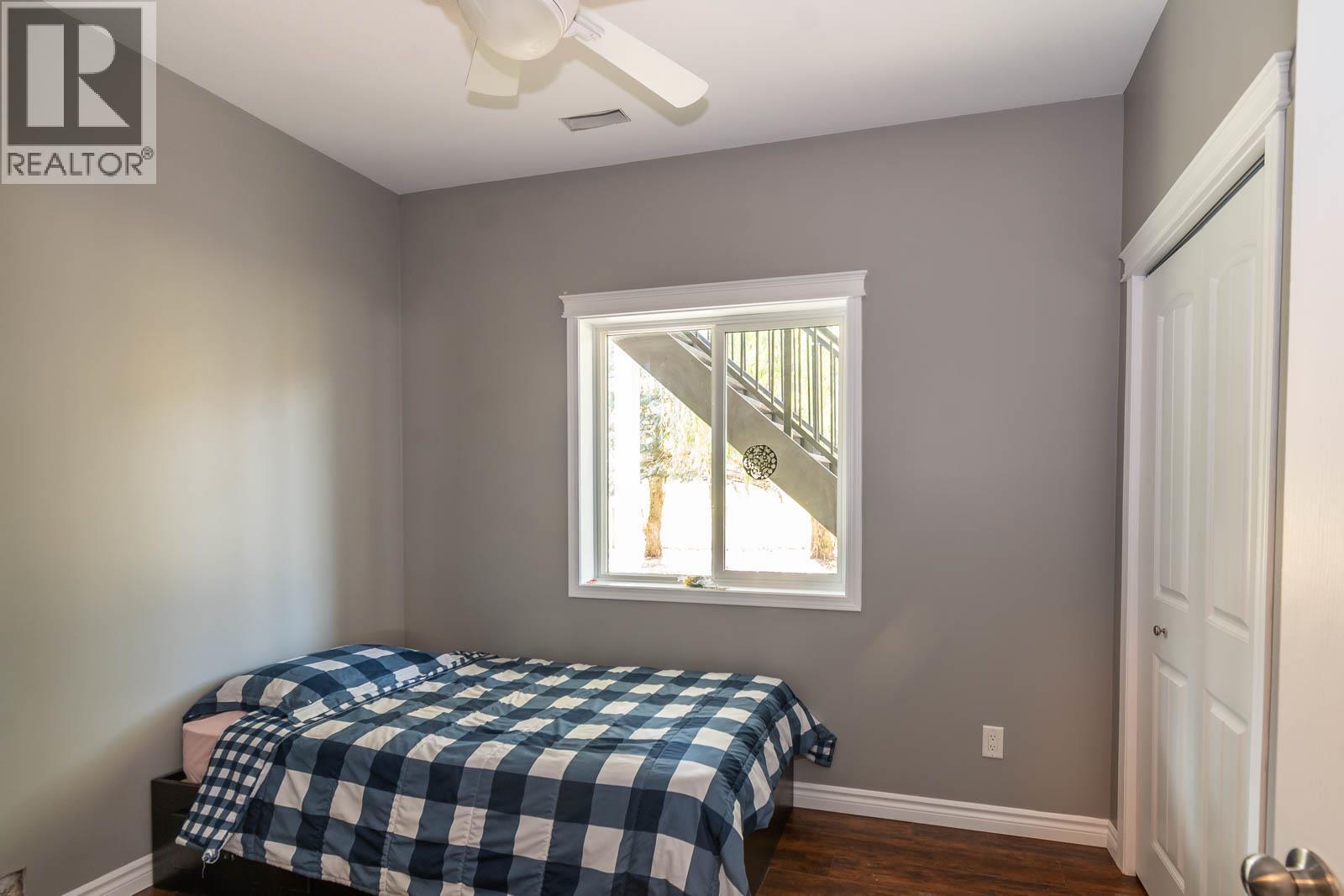 Lower Floor Bedroom 1 - 2234 Tappen Notch Hill Road, Tappen, BC - Indoor Photo Showing Bedroom