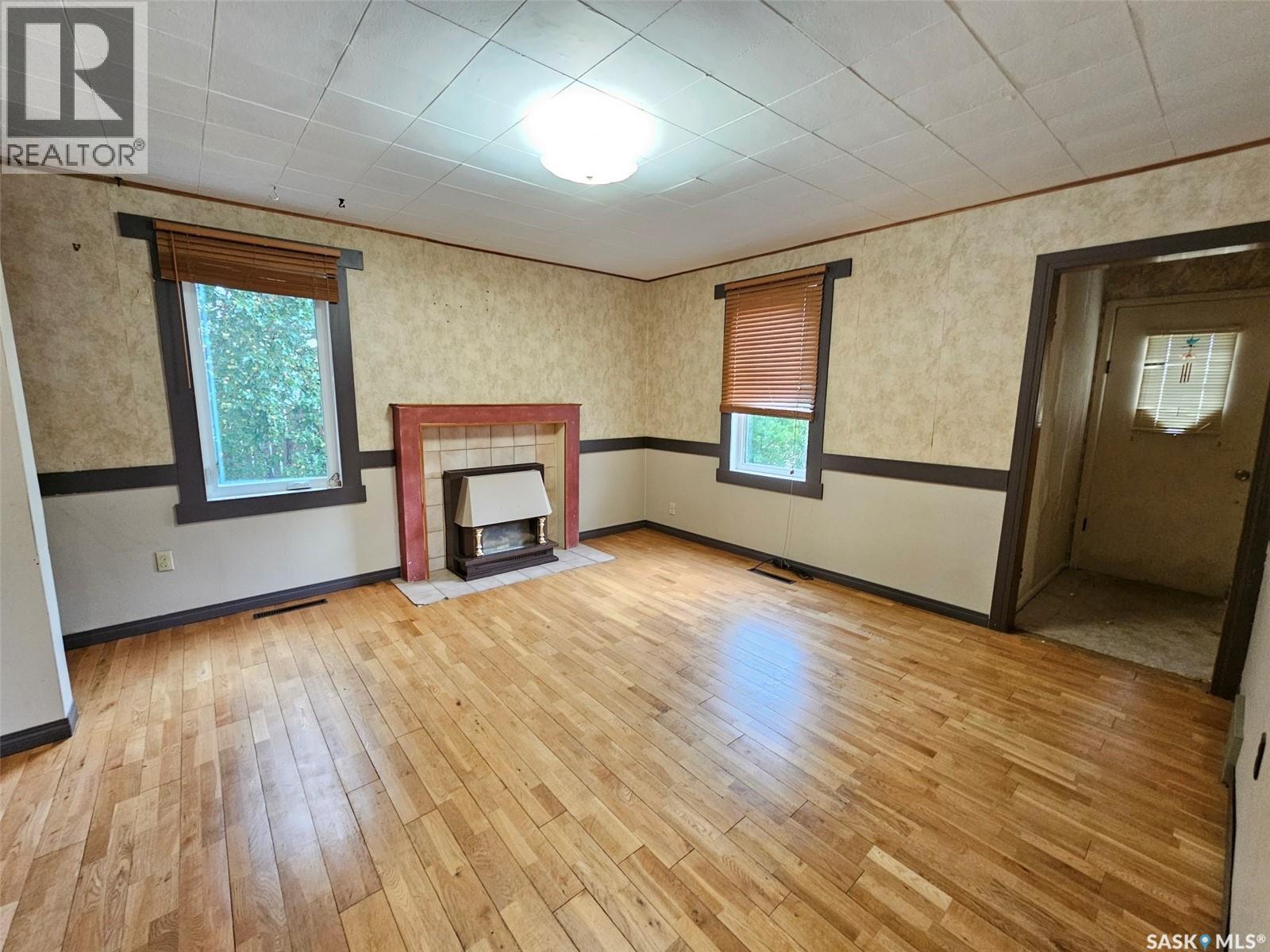 218 7Th Street W, Carlyle, SK - Indoor With Fireplace