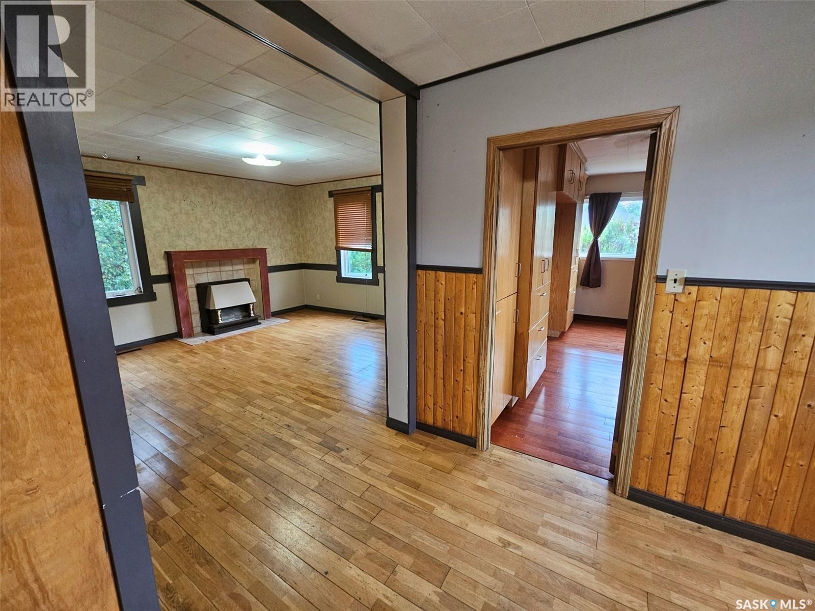 218 7Th Street W, Carlyle, SK - Indoor With Fireplace