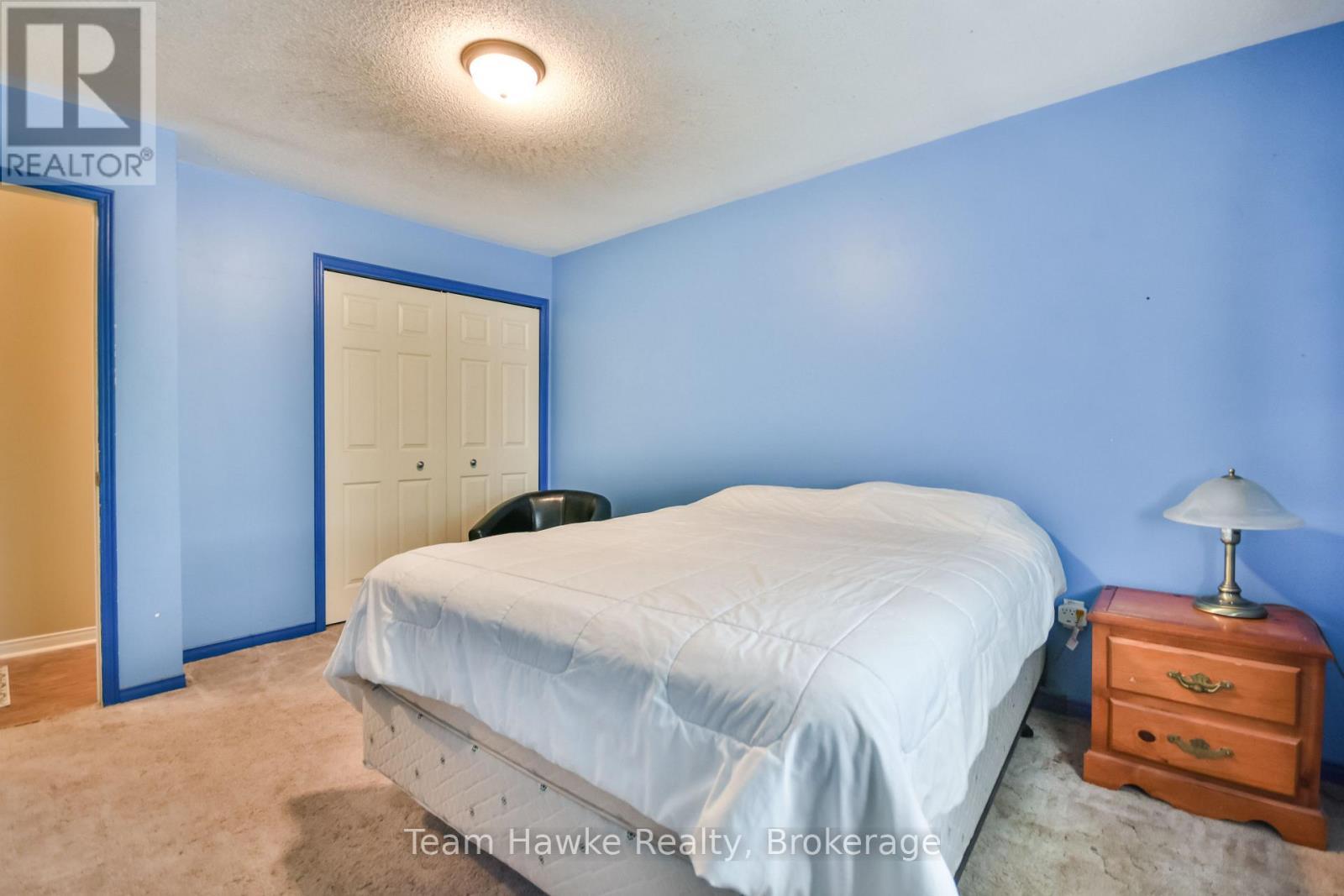 40 St. Laurent Boulevard, Tiny, ON - Indoor Photo Showing Bedroom