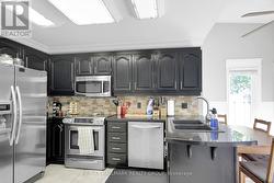 Kitchen w/ 4 SS appliances -