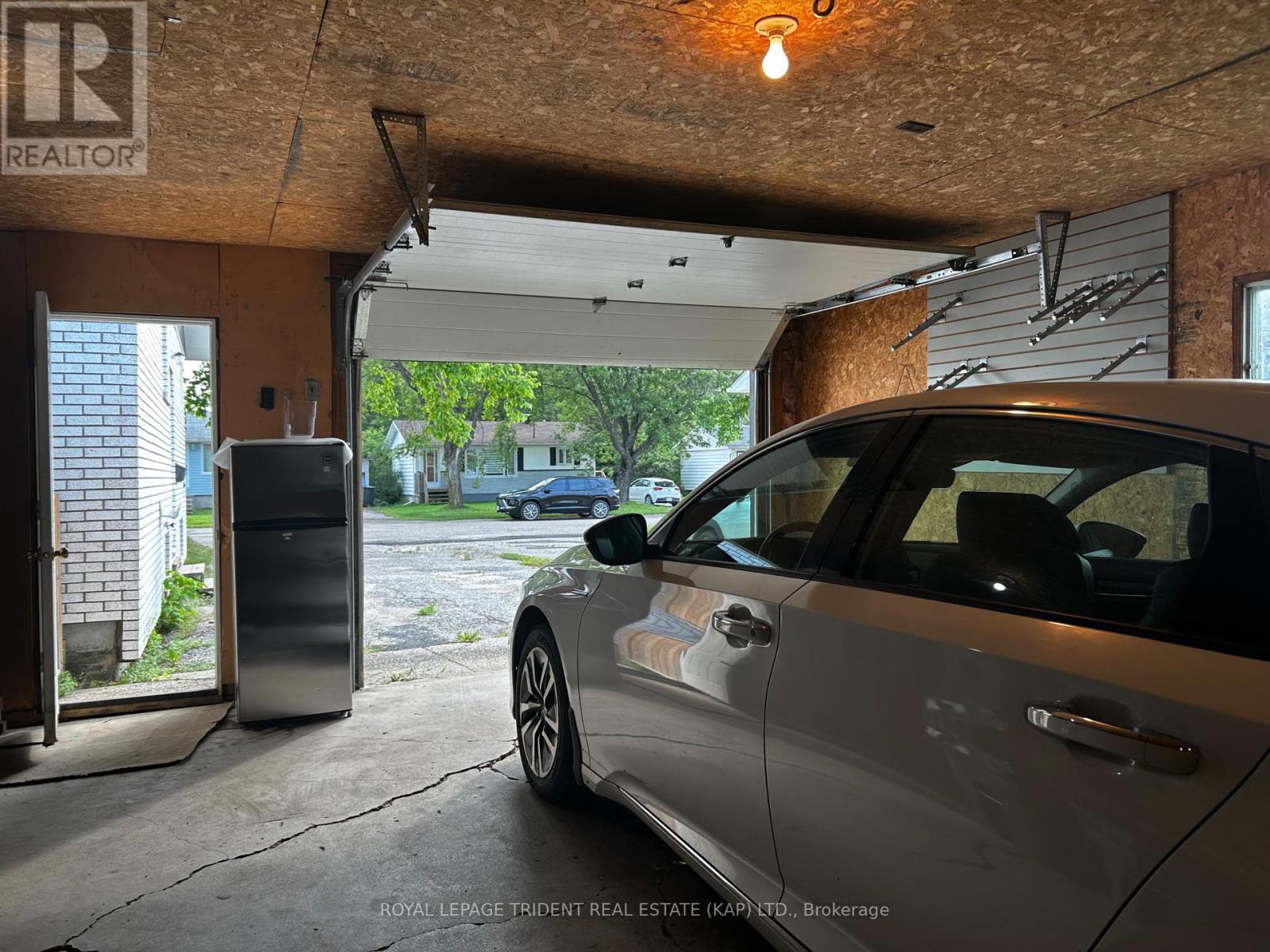 garage interior - 14 Niagara Street W, Kapuskasing, ON - Indoor Photo Showing Garage