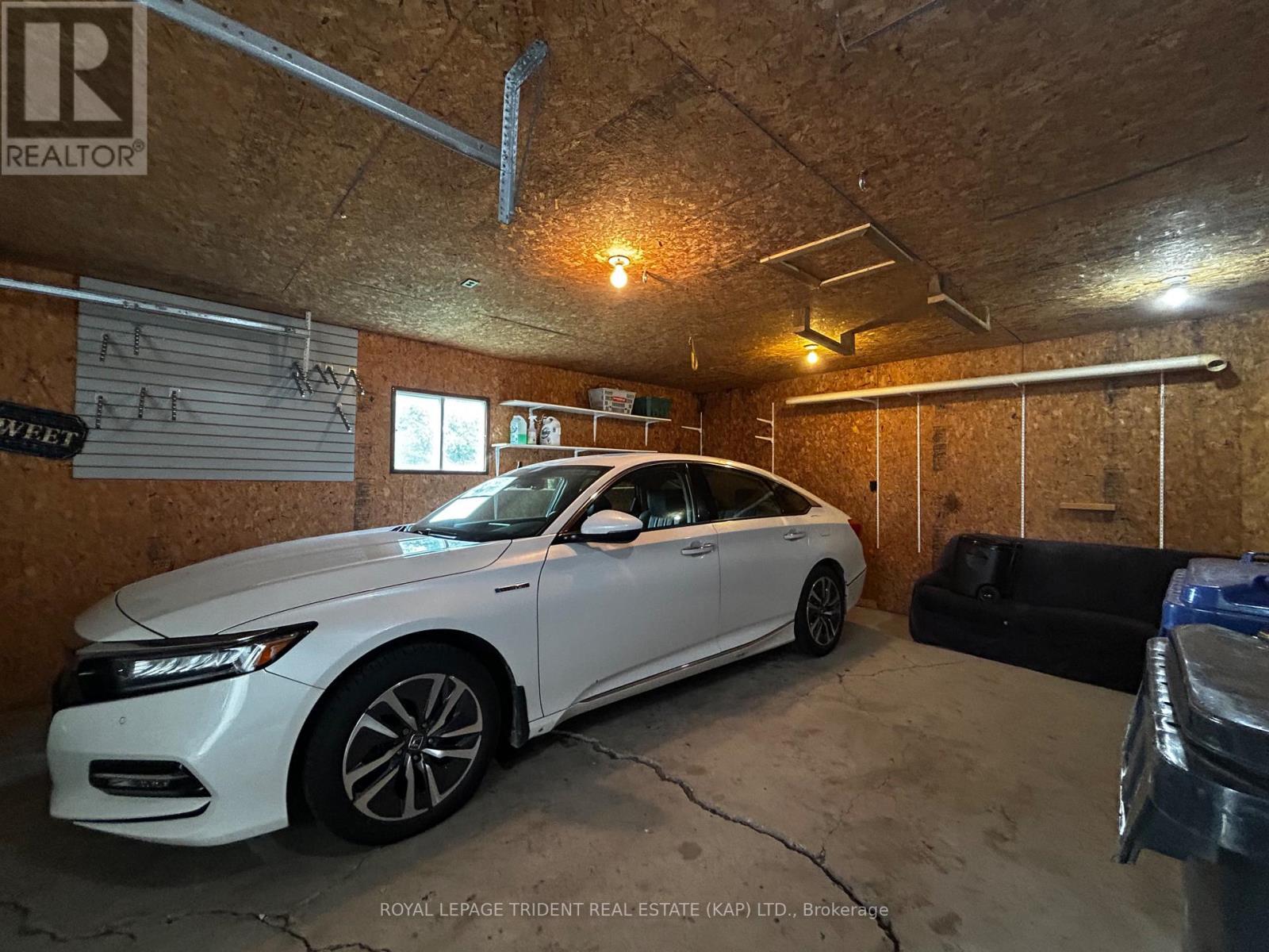 garage interior - 14 Niagara Street W, Kapuskasing, ON - Indoor Photo Showing Garage