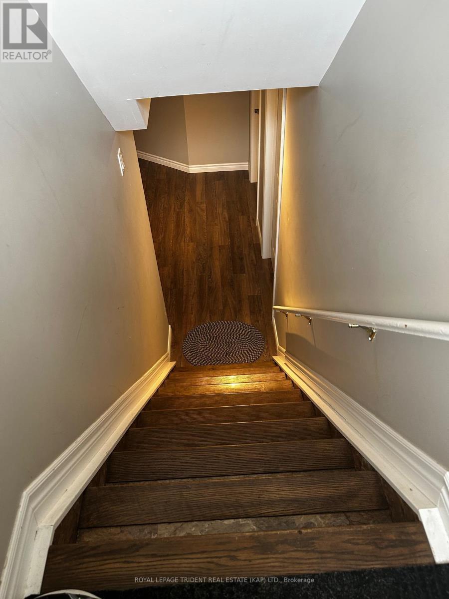 stairs leading to lower level - 14 Niagara Street W, Kapuskasing, ON - Indoor Photo Showing Other Room