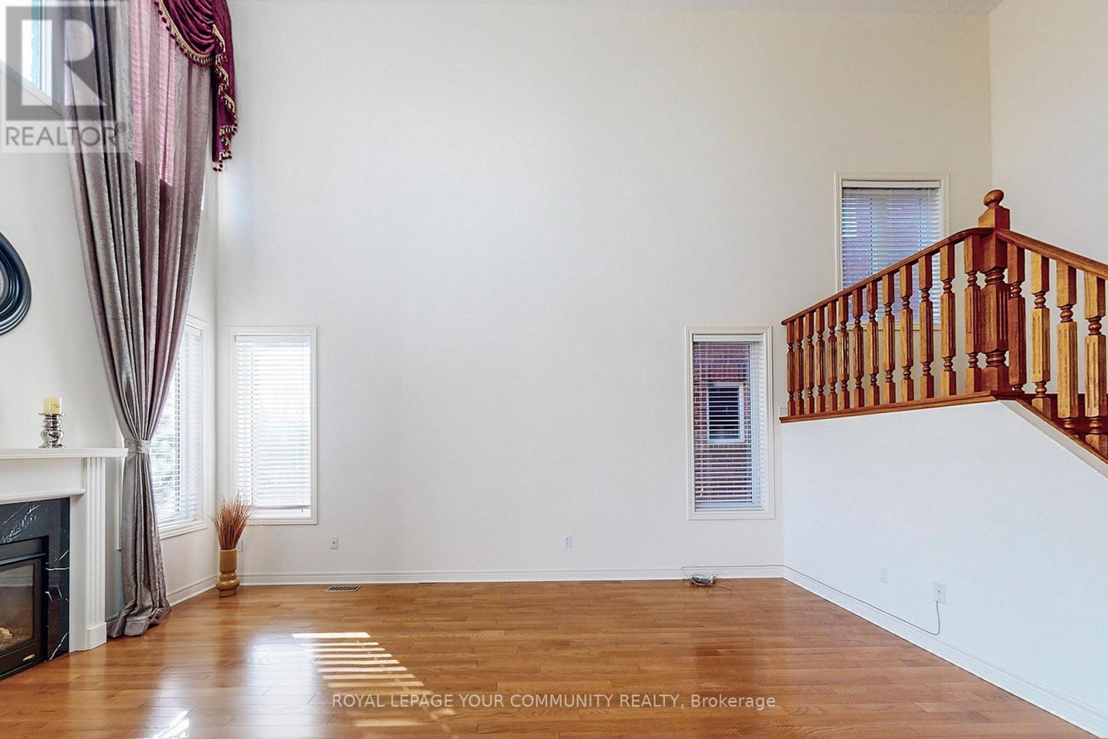 131 Aikenhead Avenue, Richmond Hill, ON - Indoor Photo Showing Other Room With Fireplace