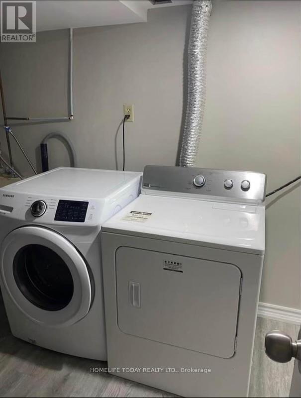 Bsmt - 17 Whispering Willow Pathway, Toronto, ON - Indoor Photo Showing Laundry Room