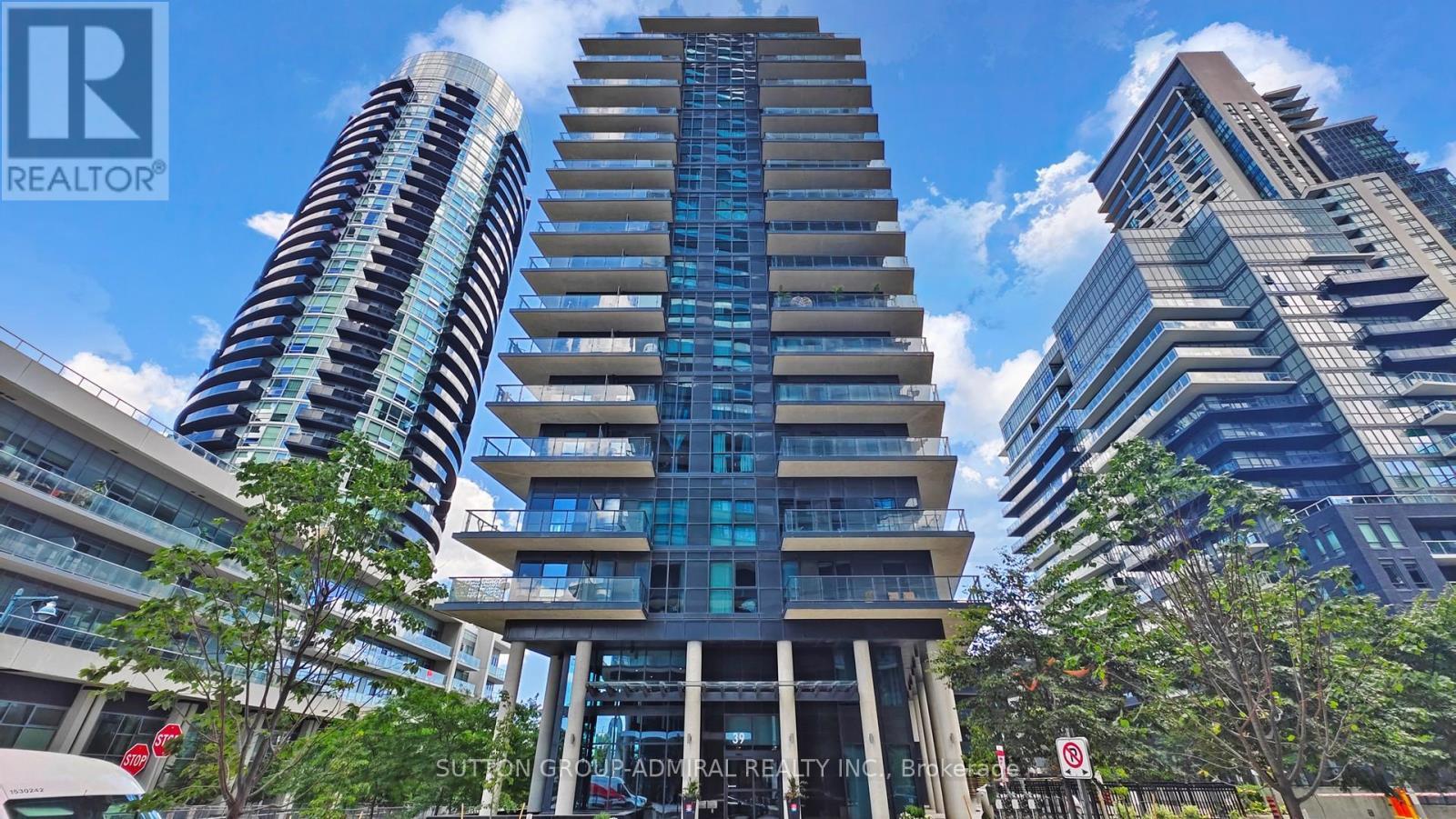 Th 104 - 39 Annie Craig Drive, Toronto, ON - Outdoor With Balcony With Facade