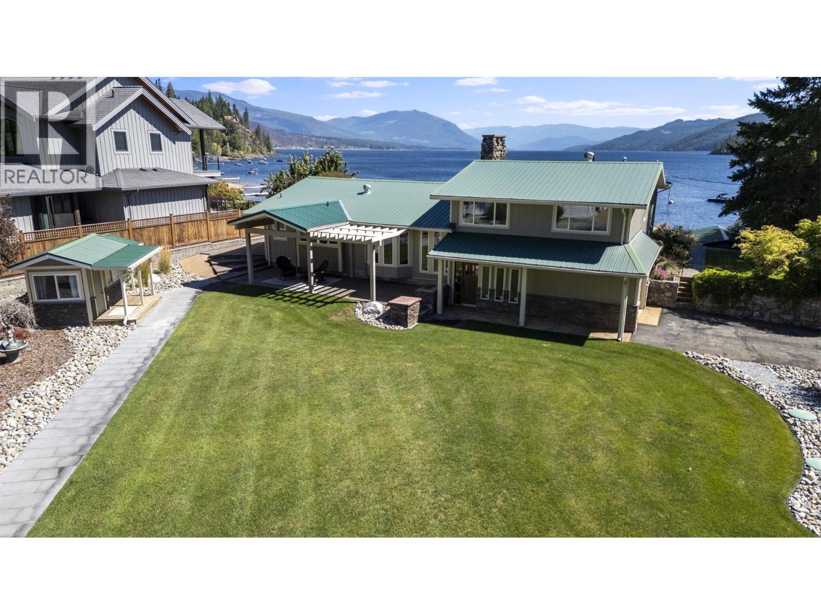 4243 Saratoga Road, Scotch Creek, BC - Outdoor With Body Of Water With Deck Patio Veranda