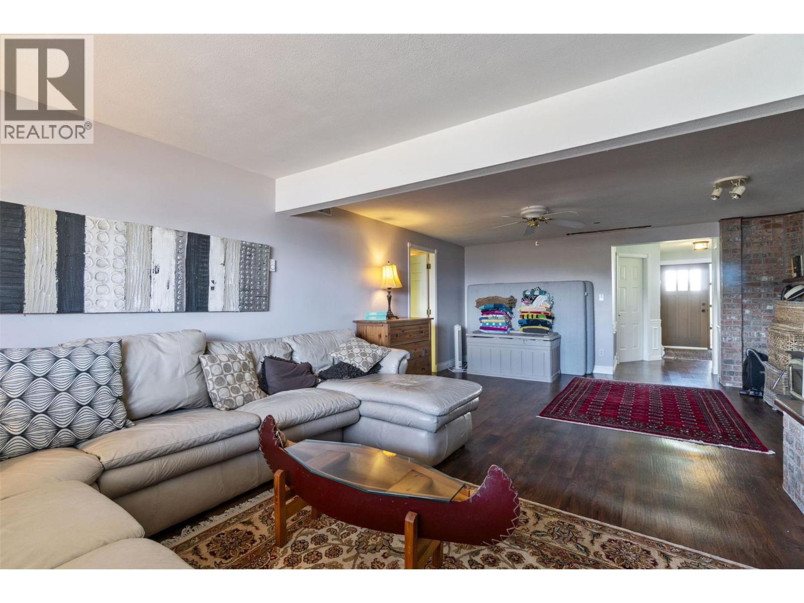 4243 Saratoga Road, Scotch Creek, BC - Indoor Photo Showing Living Room With Fireplace