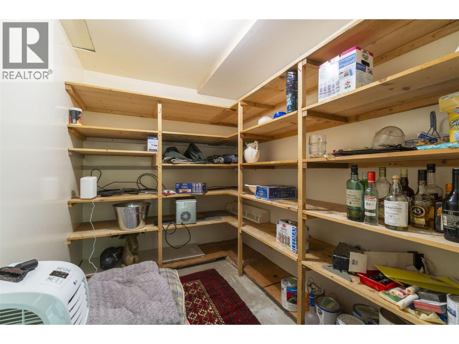 4243 Saratoga Road, Scotch Creek, BC - Indoor With Storage