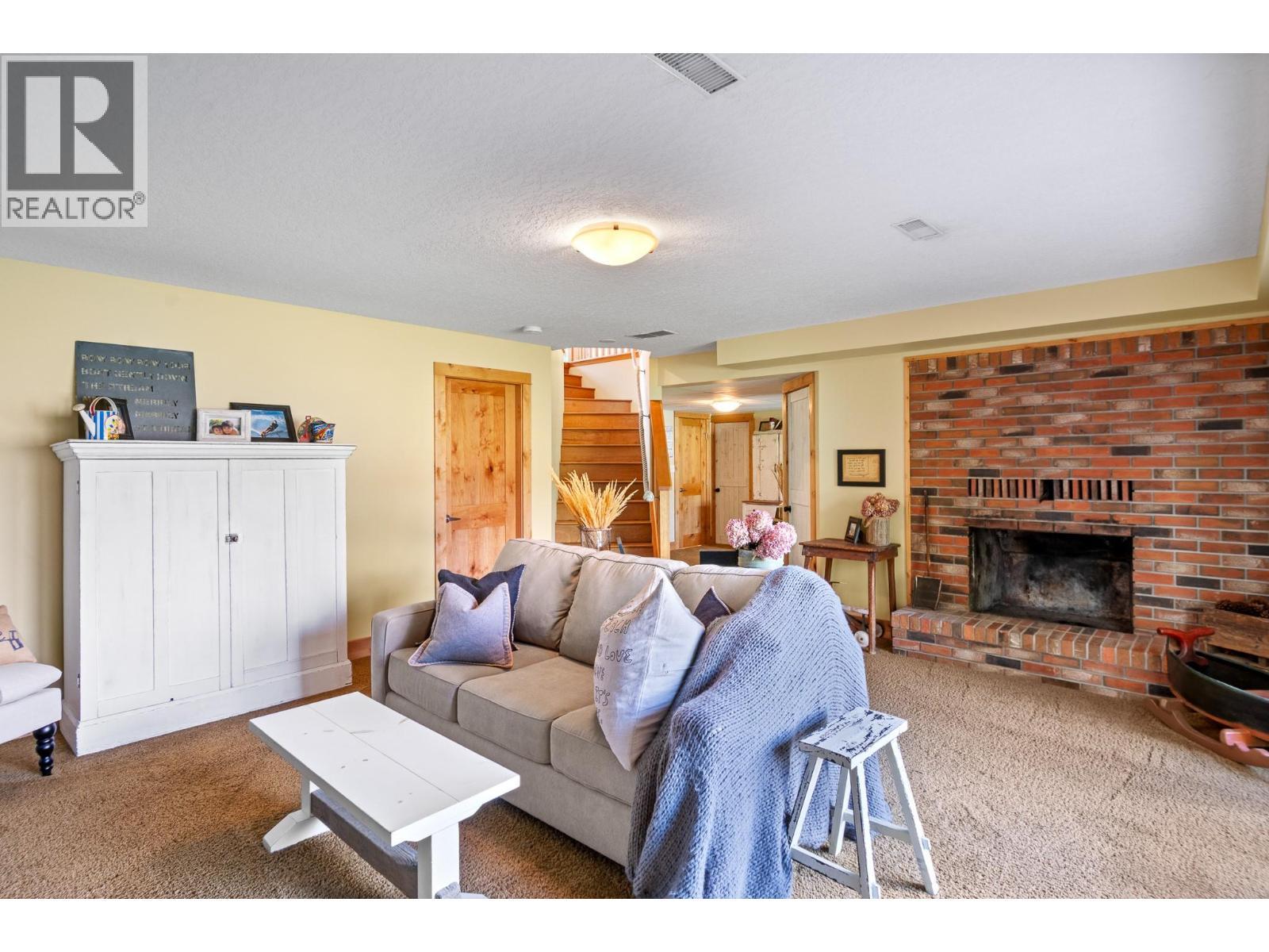 138 Devon Drive, Okanagan Falls, BC - Indoor Photo Showing Living Room With Fireplace
