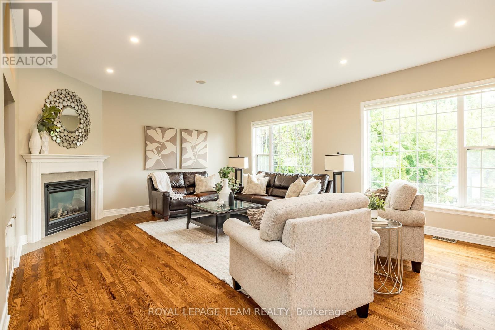 10 Beechgrove Gardens, Ottawa, ON - Indoor Photo Showing Living Room With Fireplace