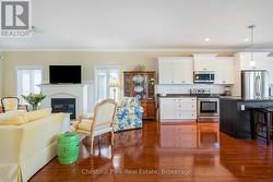 Open floor plan living- engineered hardwood floors -