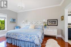 Primary bedroom with views to the greenspace -