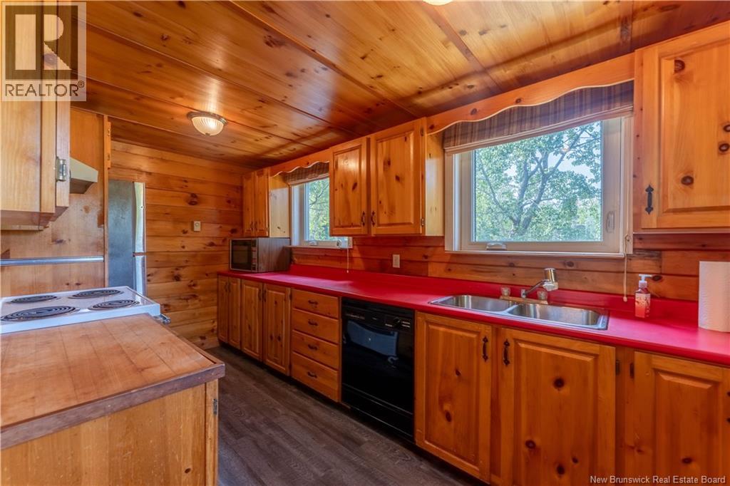 27 Bink Crescent, Harvey, NB - Indoor Photo Showing Kitchen With Double Sink