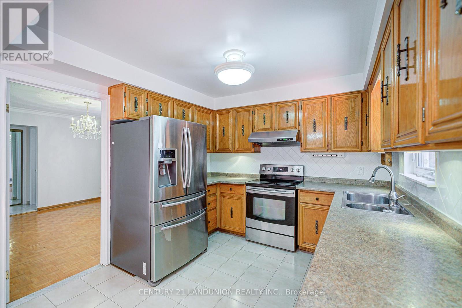 12B Burnt Bark Drive, Toronto, ON - Indoor Photo Showing Kitchen With Double Sink