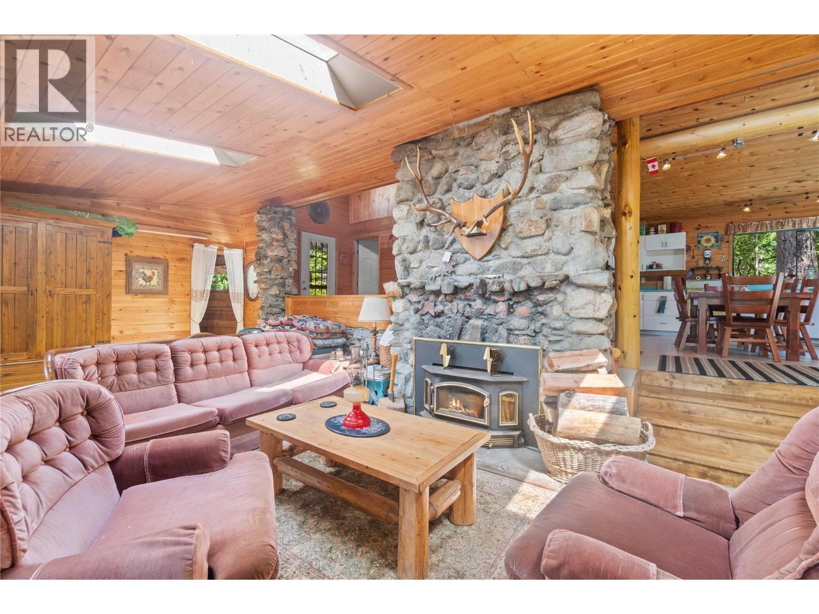 3 Queest N. Bay, Sicamous, BC - Indoor Photo Showing Living Room With Fireplace
