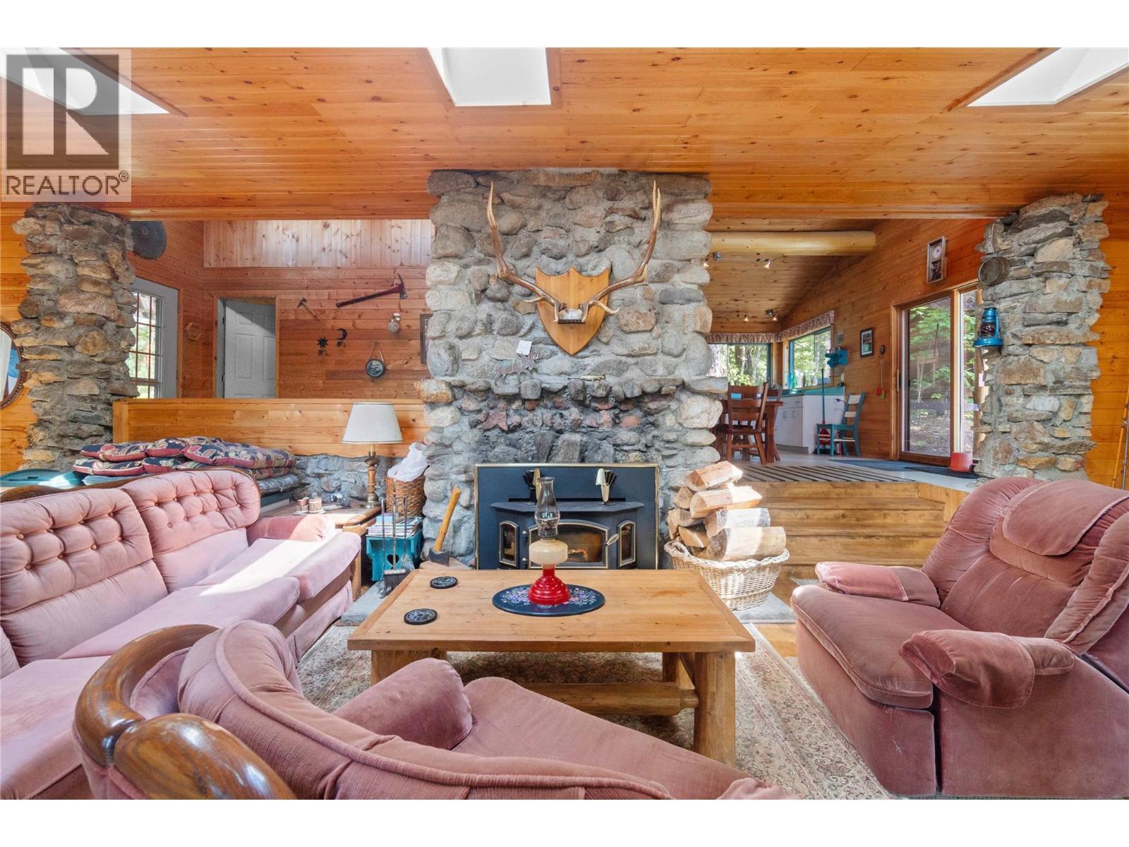 3 Queest N. Bay, Sicamous, BC - Indoor Photo Showing Living Room With Fireplace