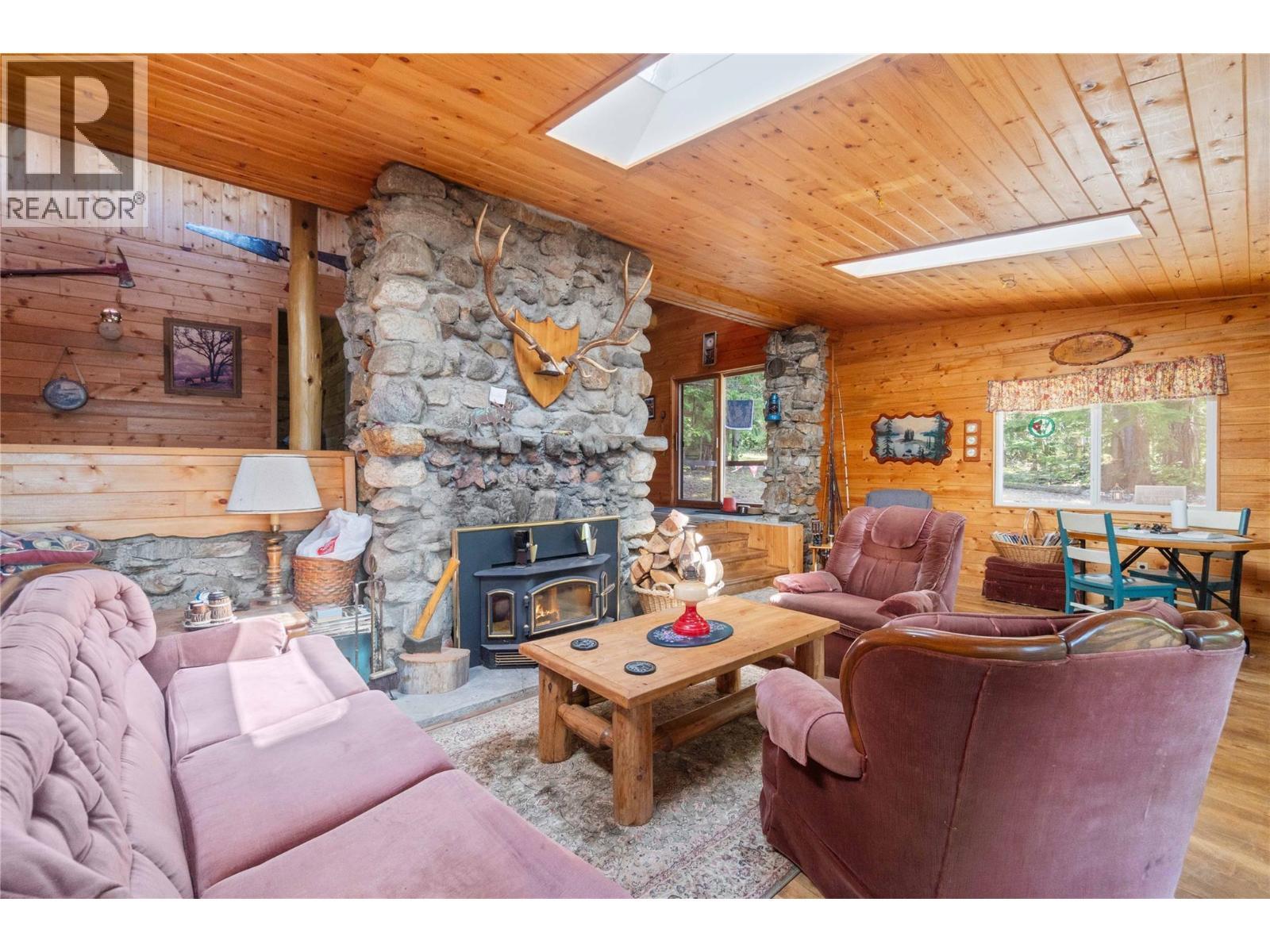3 Queest N. Bay, Sicamous, BC - Indoor Photo Showing Living Room With Fireplace