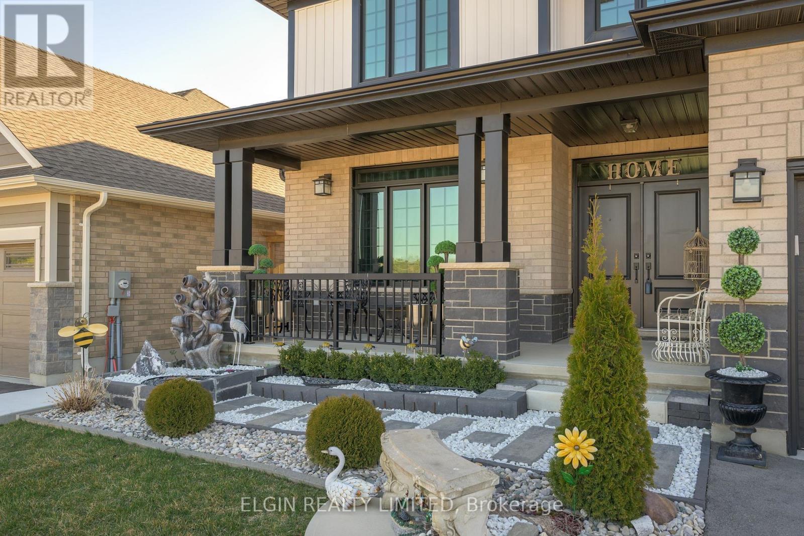 48 Snowy Owl Trail, Central Elgin, ON - Outdoor With Deck Patio Veranda With Facade