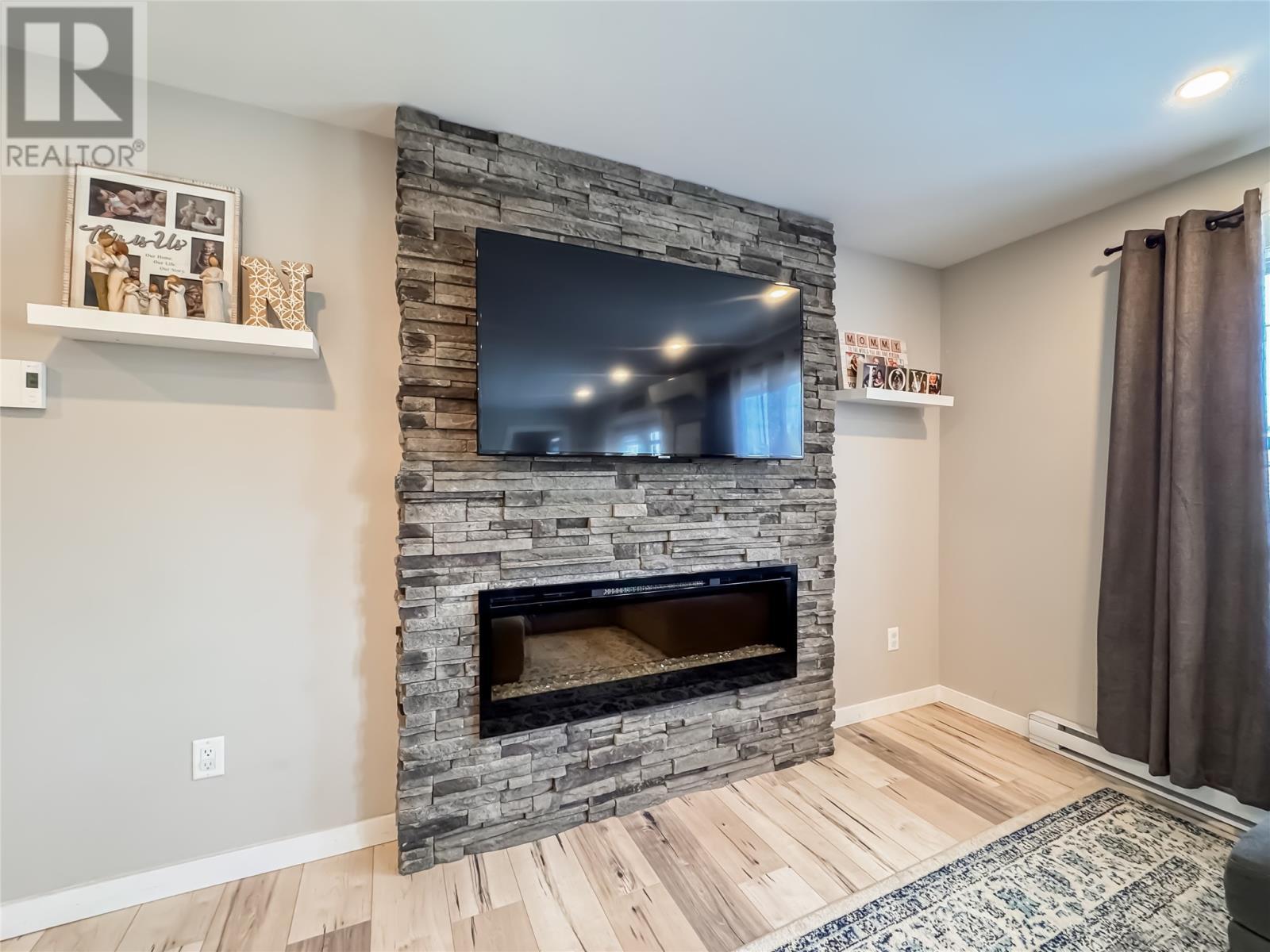 120 Pioneer Drive, Winterland, NL - Indoor Photo Showing Living Room With Fireplace